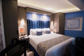 Ropa de cama de alta calidad y minibar 