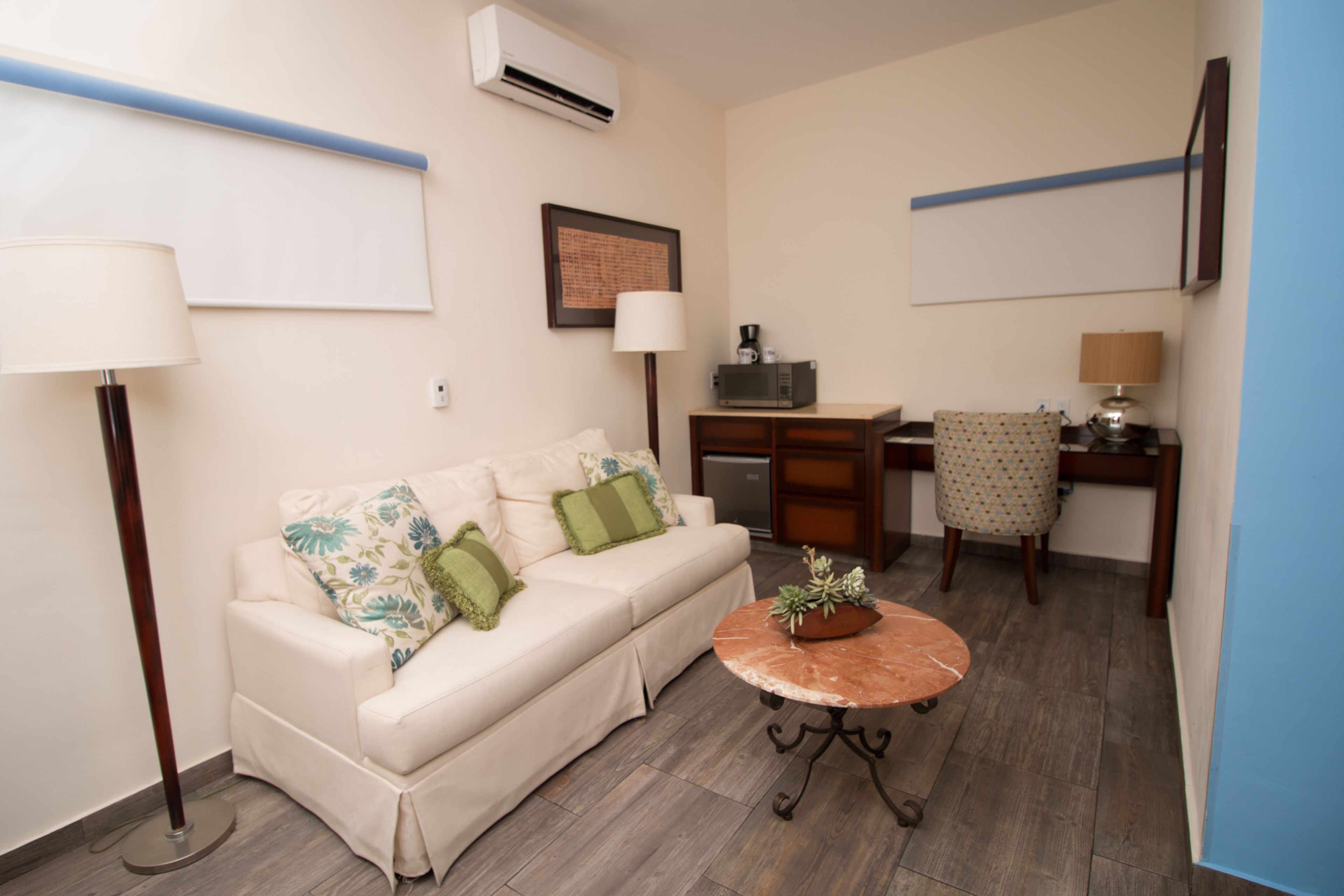 standard plus room | living area | 40-inch flat-screen tv with cable channels, tv