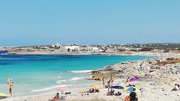 On the beach, white sand