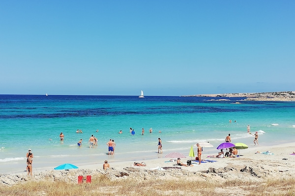 On the beach, white sand