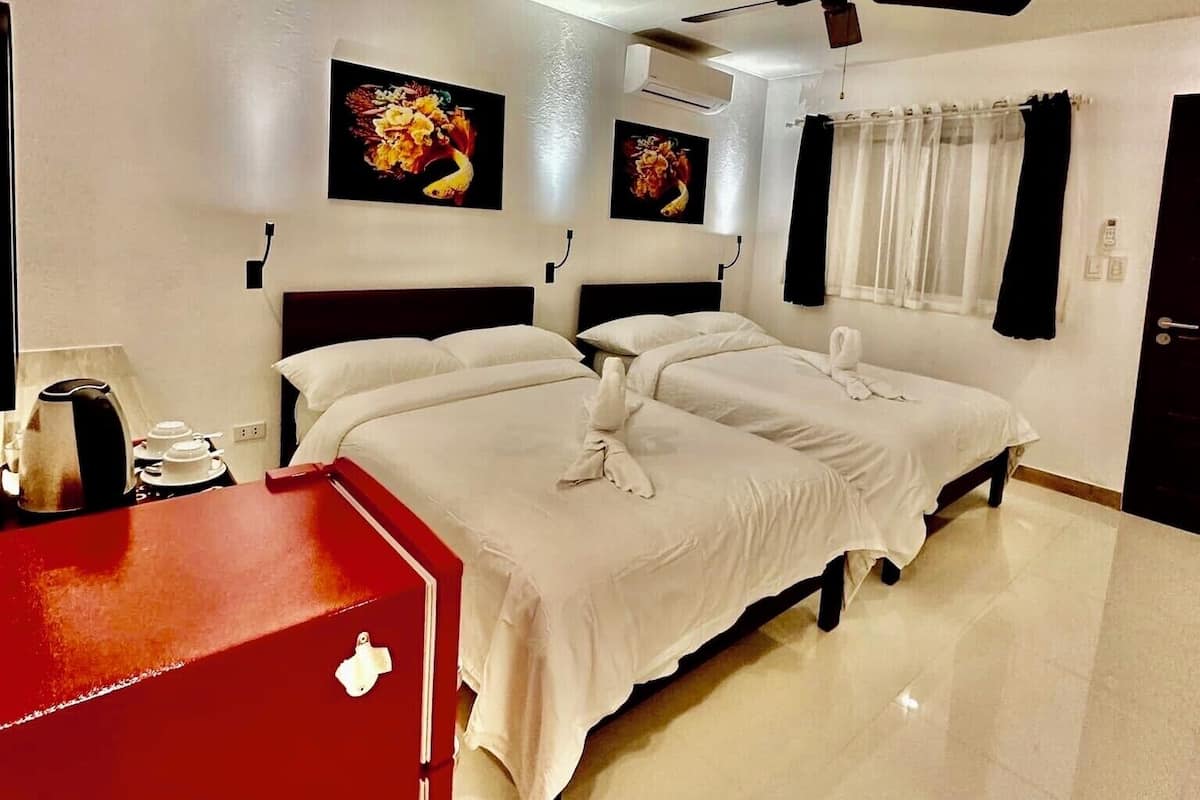 Superior Double Room, 2 Queen Beds | Minibar, in-room safe, blackout drapes, bed sheets