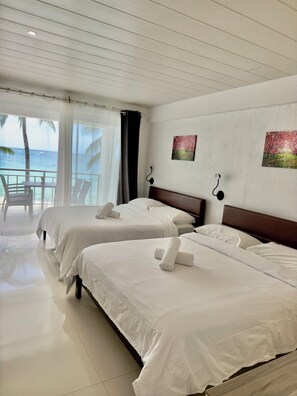 Premier Double Room, 2 Queen Beds, Balcony, Sea View | Minibar, in-room safe, blackout curtains, bed sheets - Calypso Beach & Dive Resort (Boracay Island)