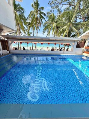 Outdoor pool, open 7:00 AM to 10:00 PM, pool loungers - Calypso Beach & Dive Resort (Boracay Island)