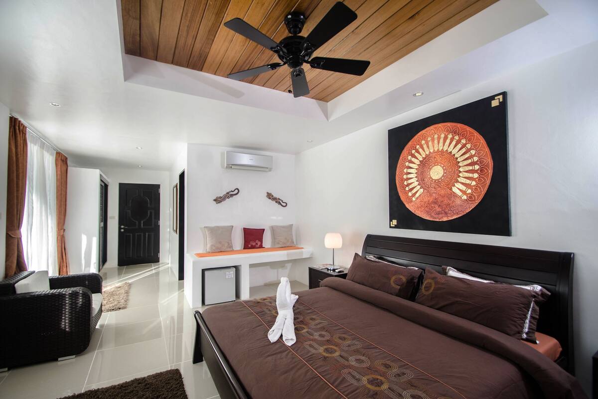 Kamar Premier, pemandangan samudra (Deluxe) | Minibar, brankas, tirai kedap cahaya, dan seprai linen