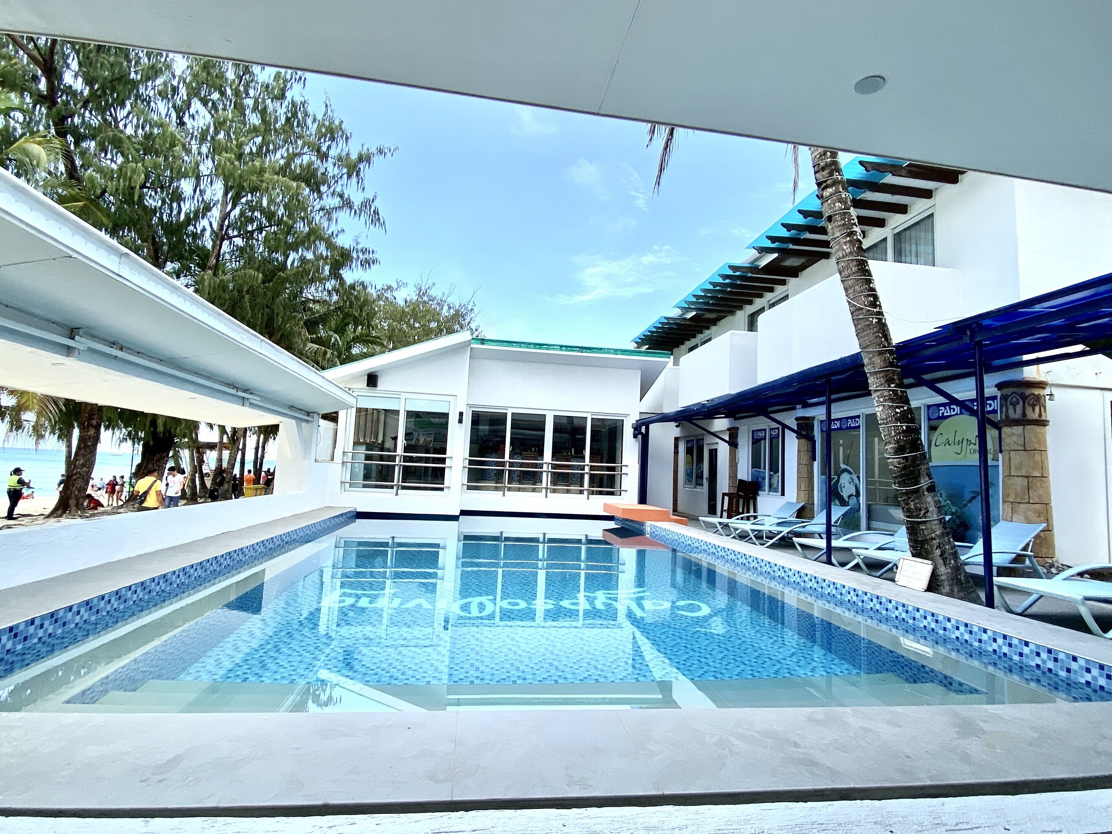 Outdoor pool, open 7:00 AM to 10:00 PM, sun loungers