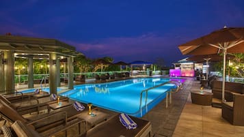 Outdoor pool, open 8:00 AM to 8:00 PM, pool umbrellas, pool loungers