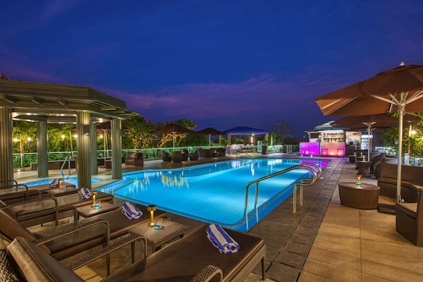 Outdoor pool, open 8:00 AM to 8:00 PM, pool umbrellas, sun loungers