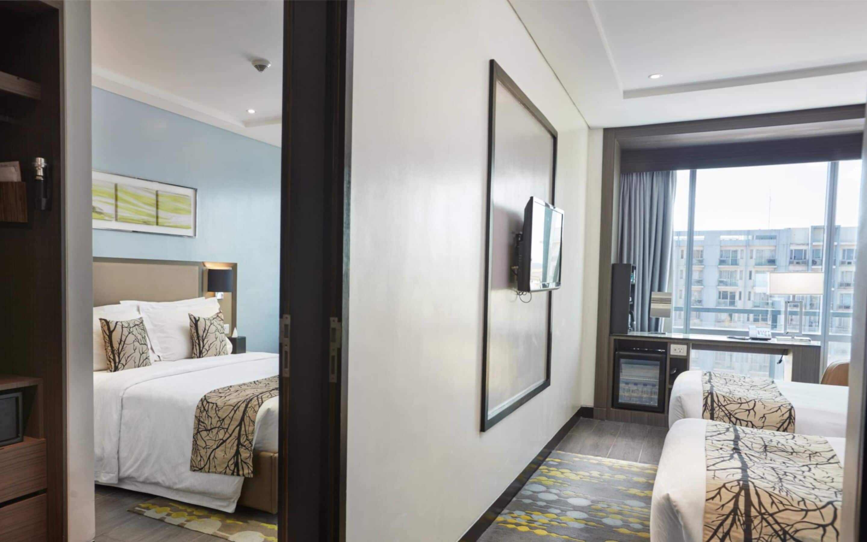 Family Connecting Room | In-room safe, individually decorated, individually furnished, desk