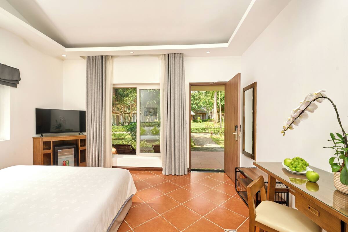 Bungalow, quang cảnh vườn | Bộ đồ giường cao cấp, minibar, két bảo mật tại phòng, bàn 