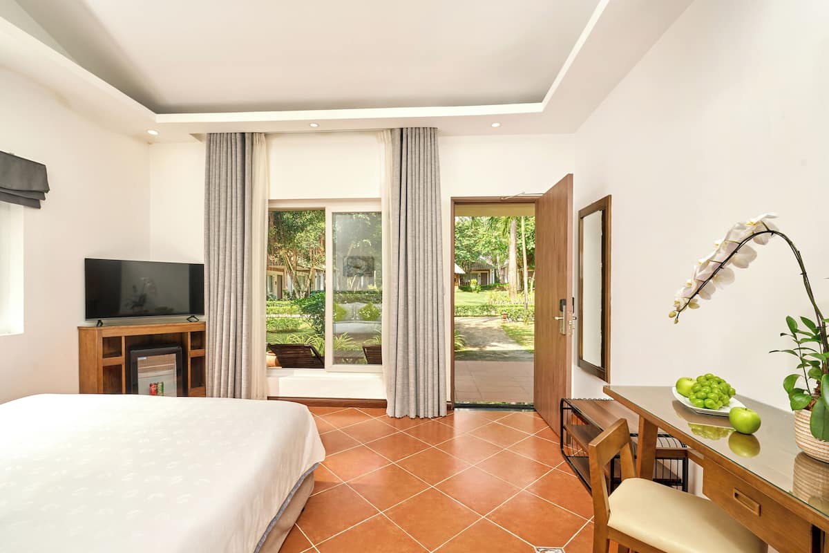Bungalow, quang cảnh vườn | Bộ đồ giường cao cấp, minibar, két bảo mật tại phòng, bàn