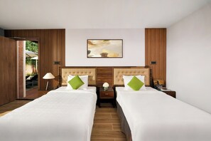 Bangalô, vista para o jardim | Roupas de cama premium, frigobar, cofres nos quartos, escrivaninha