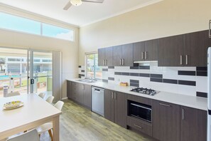 3 Bedroom Villa | Private kitchen | Full-sized fridge, microwave, stovetop, dishwasher