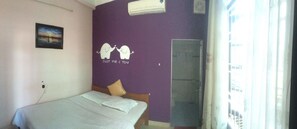 Quarto casal standard, vista para a cidade | Frigobar, escrivaninha, Wi-Fi de cortesia