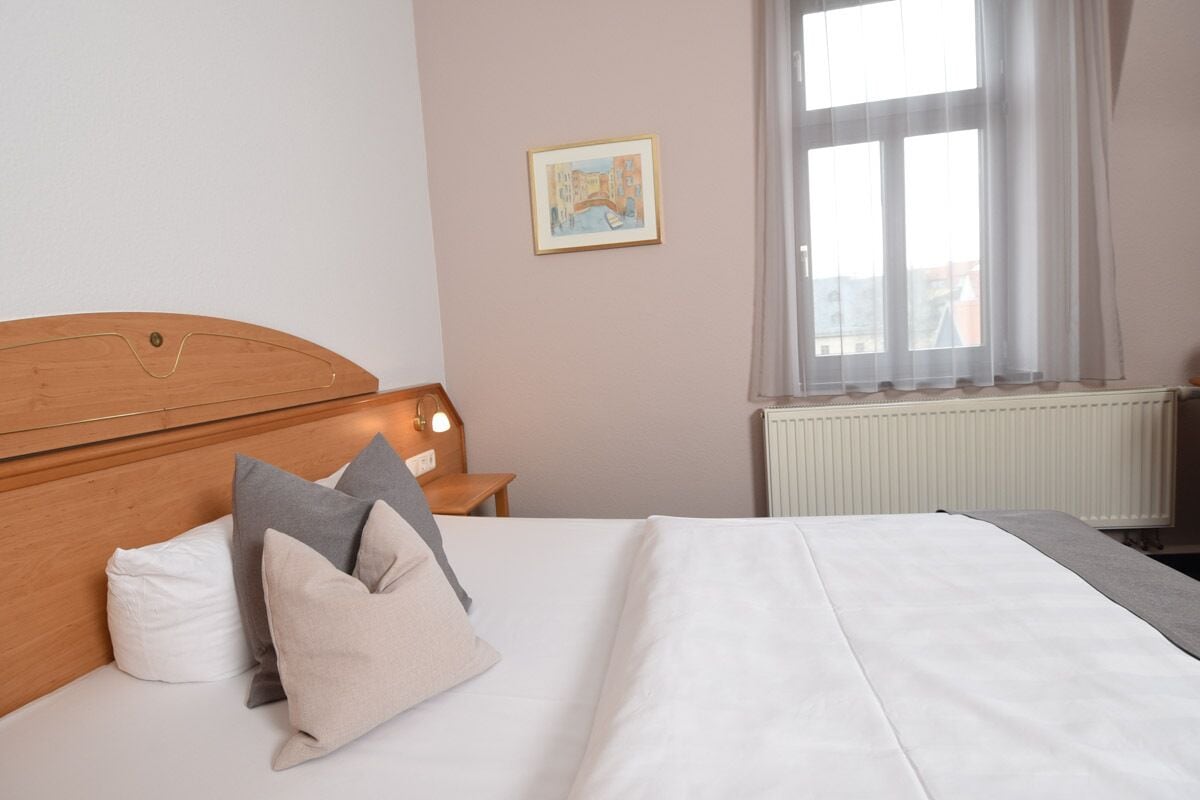 classic single room, 1 king bed | hypo-allergenic bedding, desk, blackout curtains, cots/infant beds