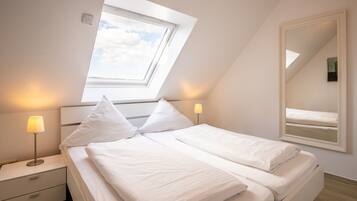 Apartment, 1 Bedroom, Courtyard Area | In-room safe, iron/ironing board, WiFi (free), bed sheets