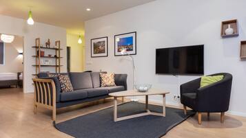 Premium Apartment, 3 Bedrooms | Living area | 48-inch TV with satellite channels