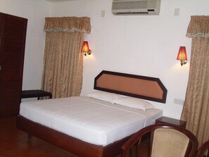 Premium bedding, desk, iron/ironing board, rollaway beds
