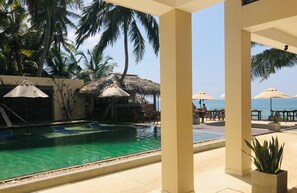Superior Double Room Ground Pool View | View from room - Sapphire Seas Beachfront Hotel (Hikkaduwa)