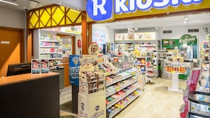 A R Kioski store with a variety of products on shelves and a checkout area. - Holiday Club Turun Caribia (Turku)