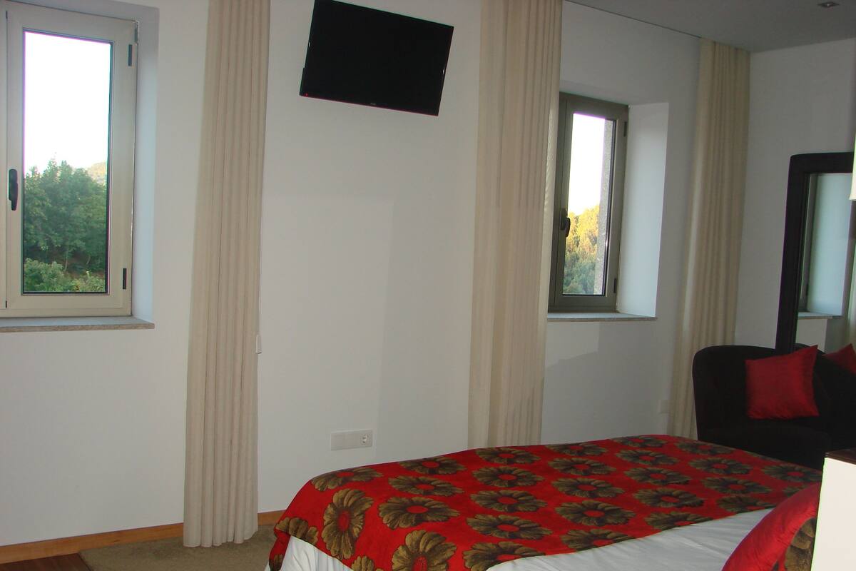 Suite Deluxe, hidromasaje | Ropa de cama de alta calidad y minibar 