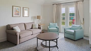 Veranda Suite | Living area | 42-inch flat-screen TV with cable channels, TV