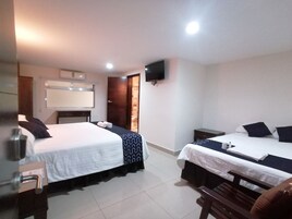 Family Room | Premium bedding, in-room safe, individually furnished, desk