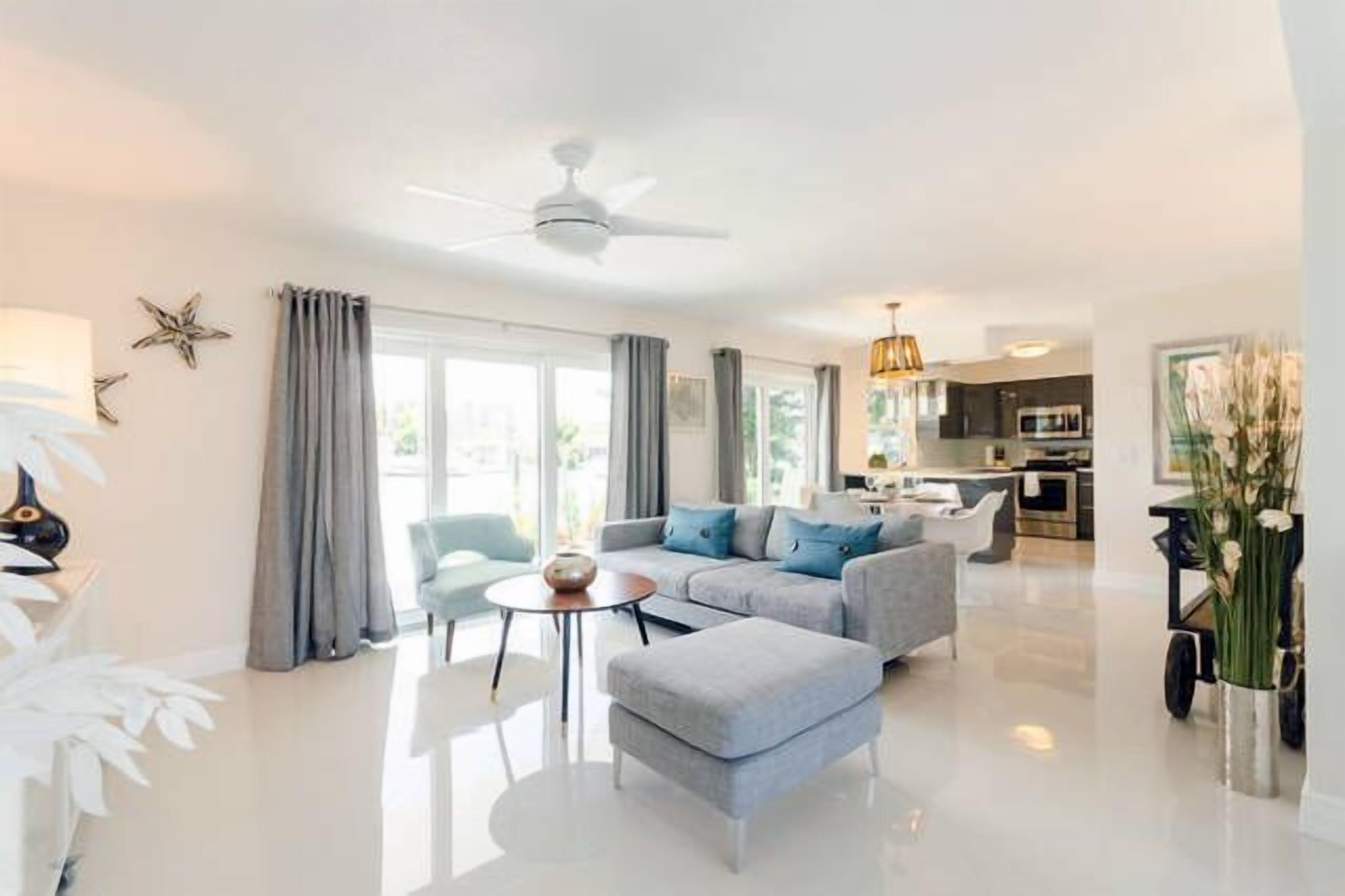 Waterfront Industrial Chic | Living area | Flat-screen TV