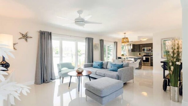 Waterfront Industrial Chic | Living area | Flat-screen TV - MCM Beach Rentals Clearwater Beach (Clearwater Beach)