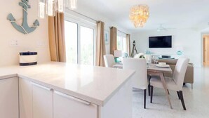 Modern Waterfront Living | Living area | Flat-screen TV - MCM Beach Rentals Clearwater Beach (Clearwater Beach)