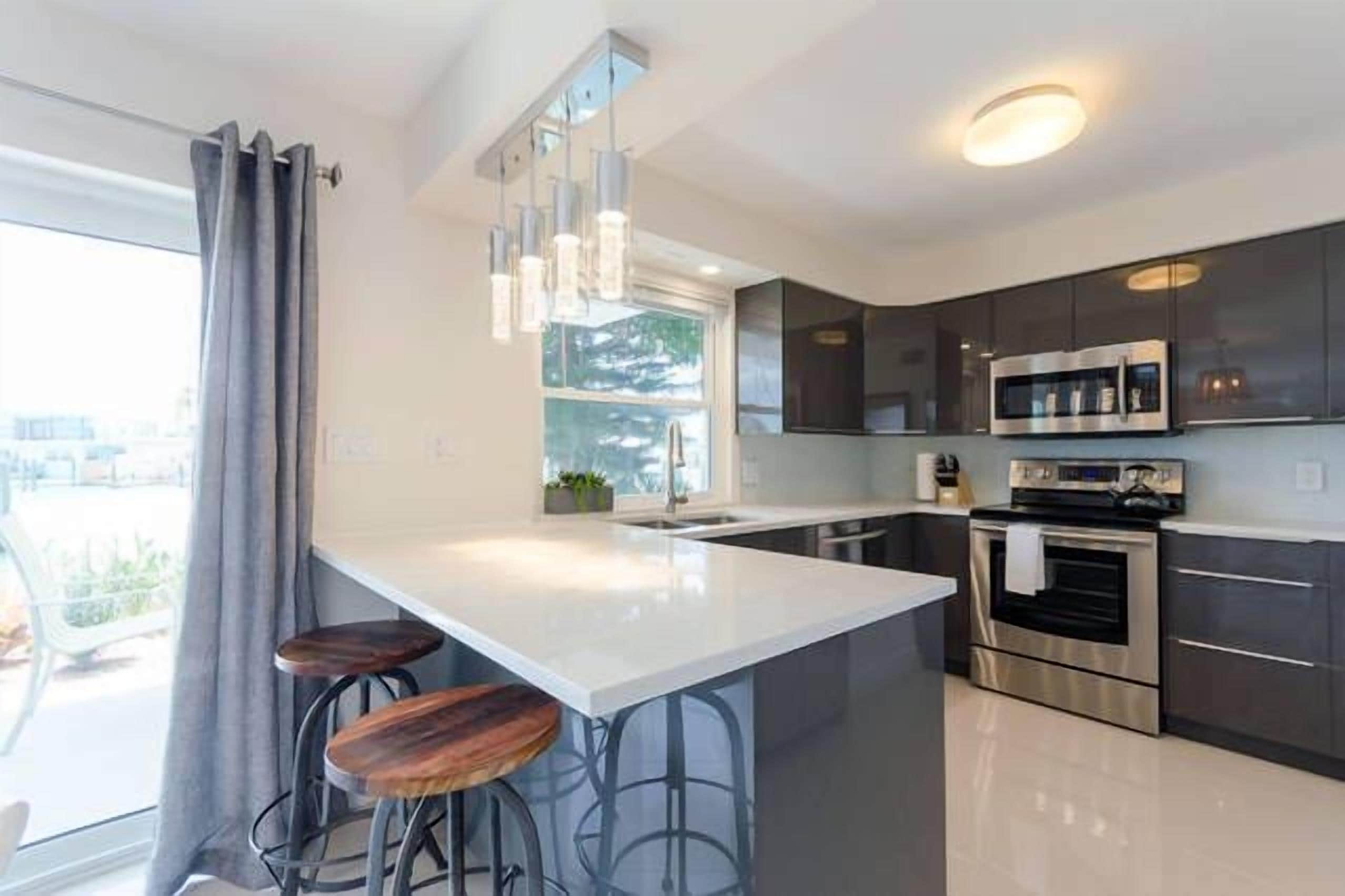 Appartement Luxe, 2 chambres, vue baie, vue mer | Cuisine privée