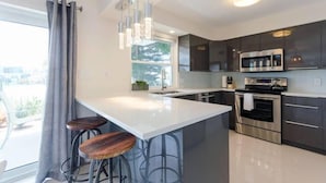 Waterfront Industrial Chic | Private kitchen | Coffee/tea maker, fridge, microwave - MCM Beach Rentals Clearwater Beach (Clearwater Beach)