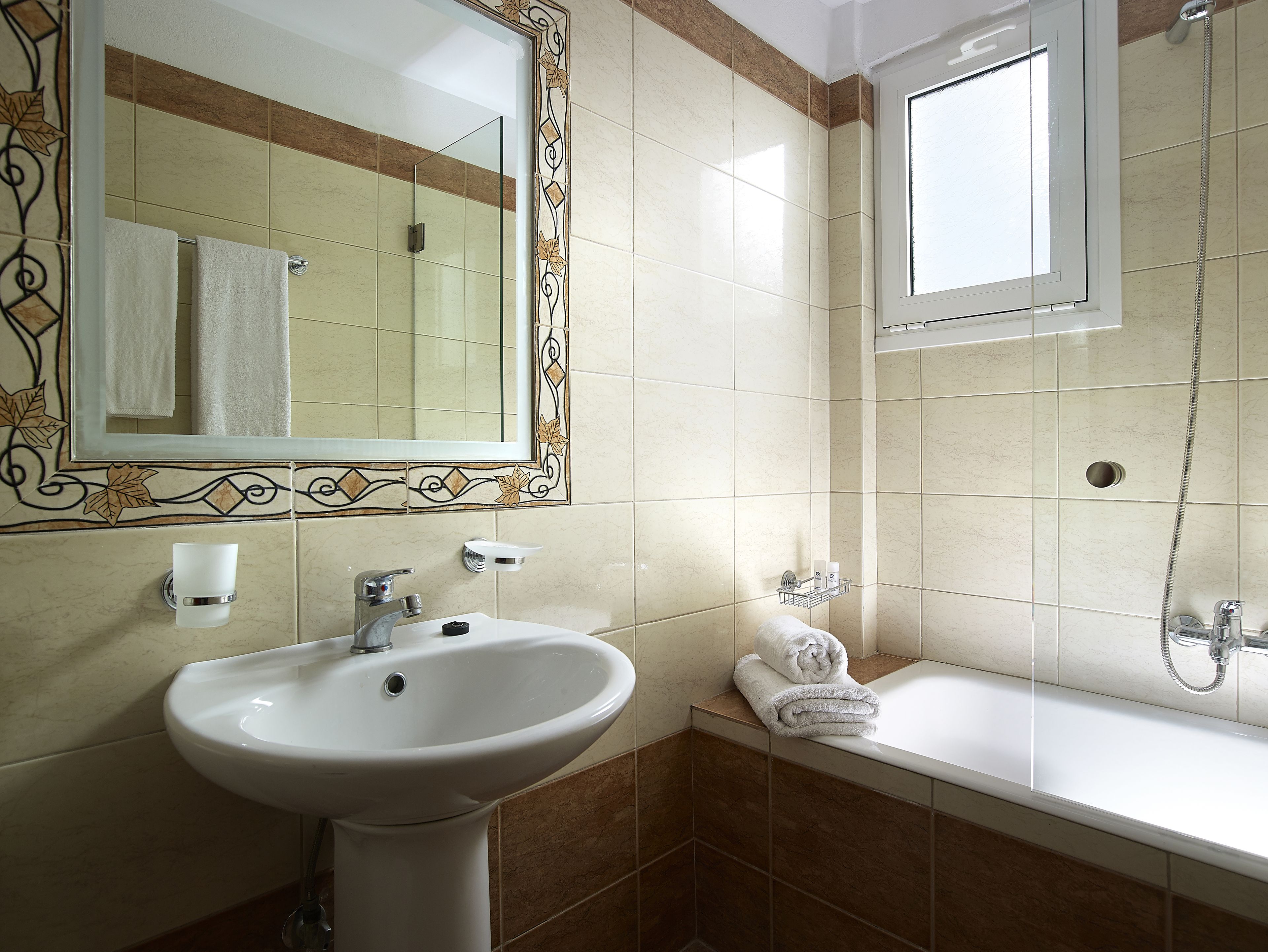 designer toiletries, hair dryer, slippers