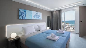 Deluxe Suite with Terrace and Sea View | Premium bedding, in-room safe, desk, soundproofing