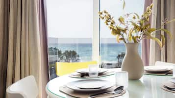 Deluxe Suite with Terrace and Sea View | Living area | LCD TV