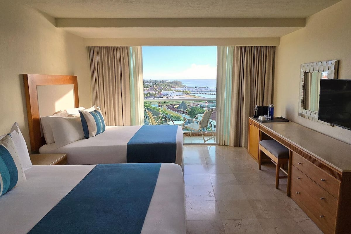Free minibar items, in-room safe, desk, blackout curtains