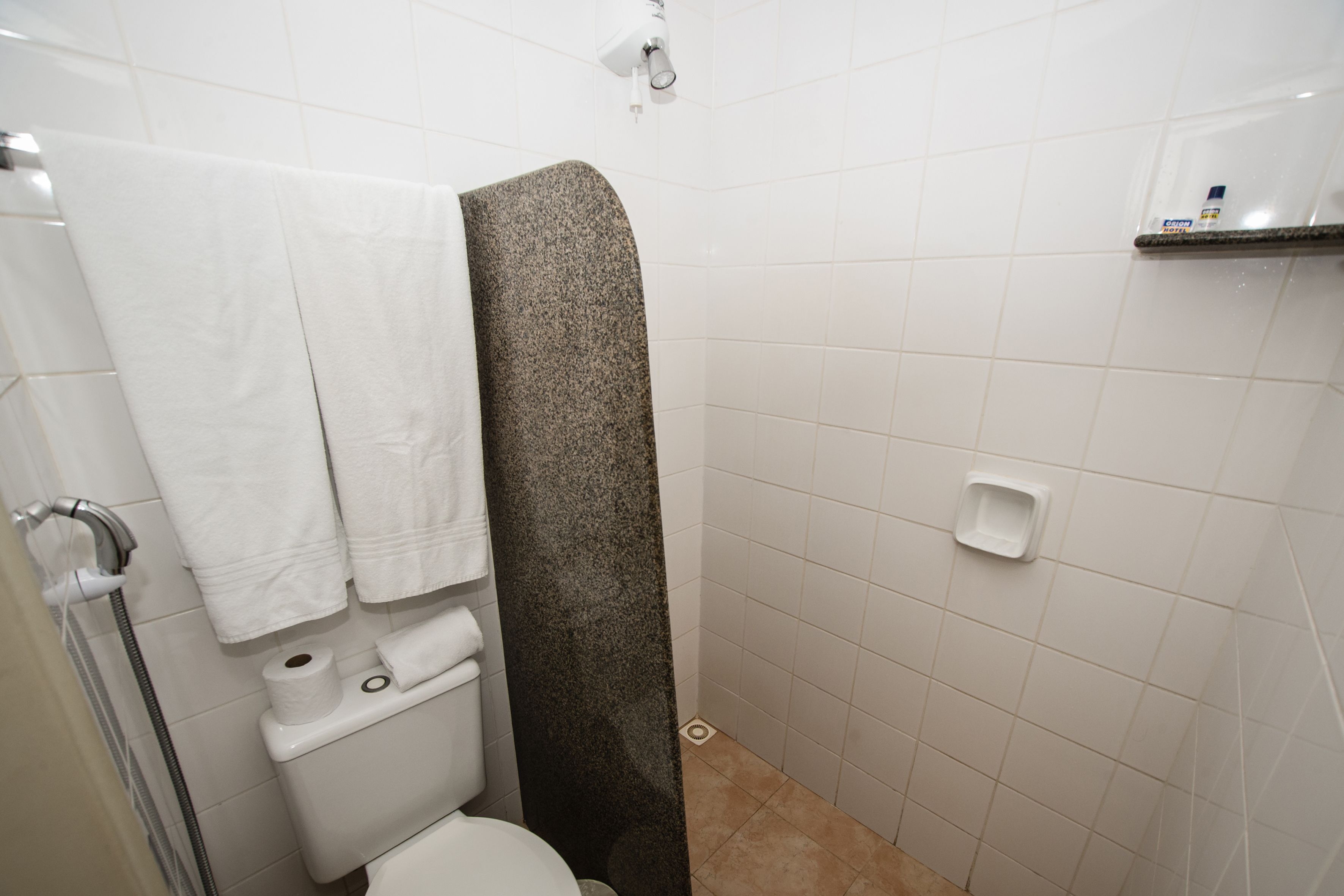 luxury room | bathroom | shower, hair dryer, towels