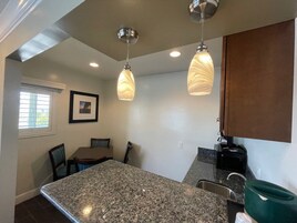 Signature Studio Suite, 1 Bedroom | Premium bedding, down comforters, iron/ironing board, free WiFi