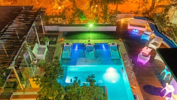 Outdoor pool, open 9:00 AM to 9:00 PM, pool loungers