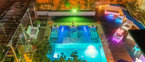 Outdoor pool, open 9:00 AM to 9:00 PM, sun loungers