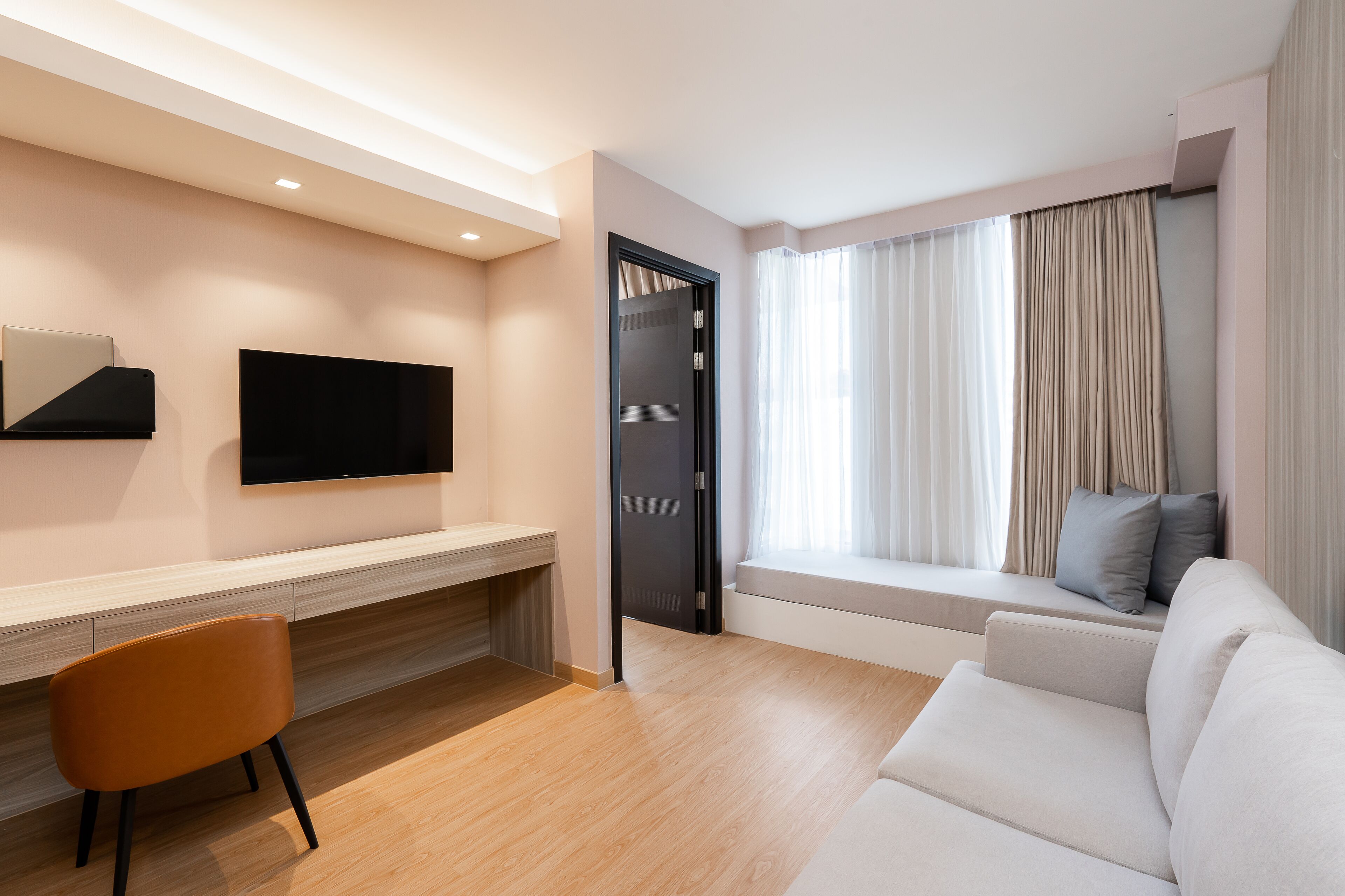 grand corner suite | living area | led tv