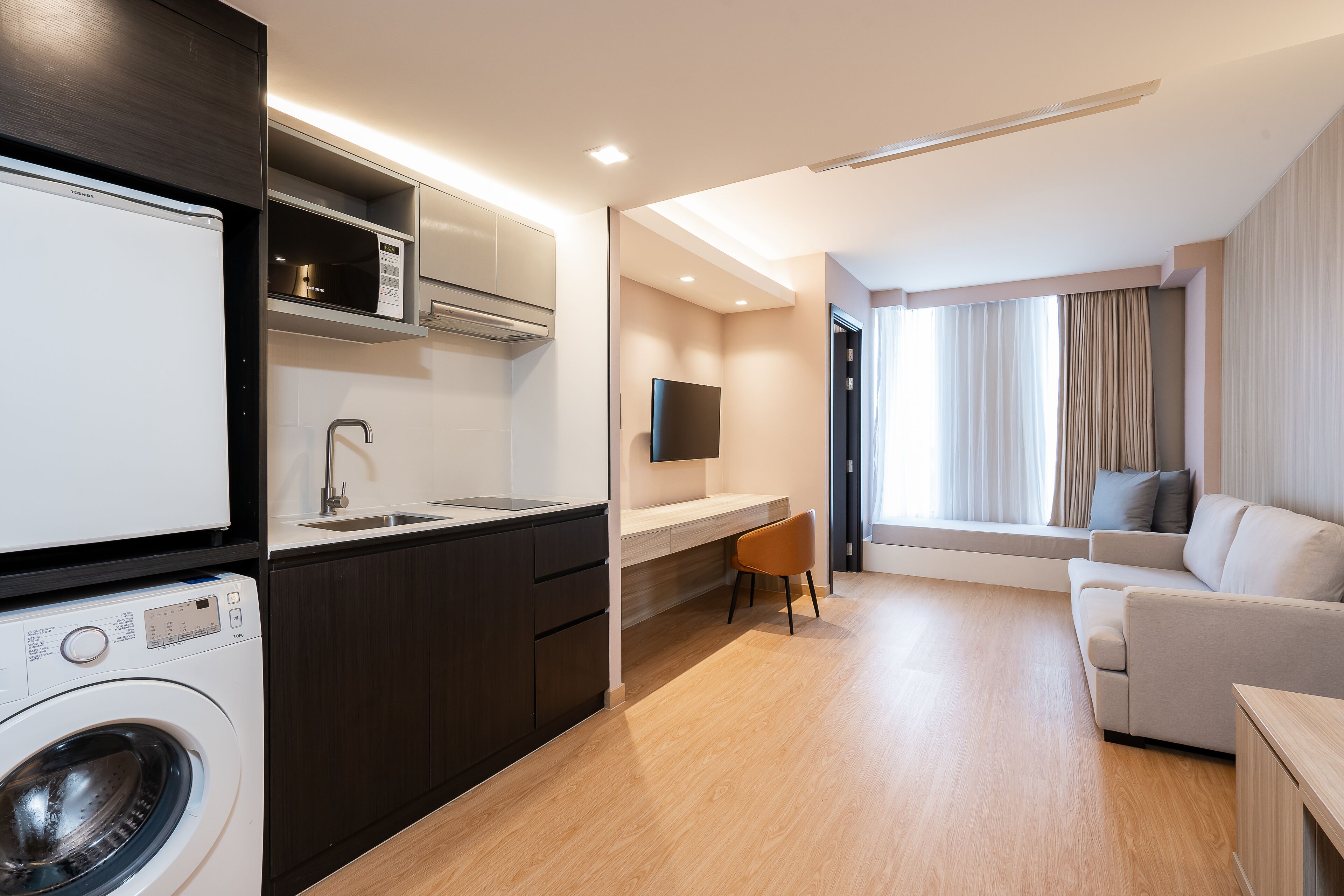 grand corner suite | living area | led tv