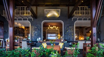 Breakfast, lunch, dinner served; Mediterranean cuisine, garden views 