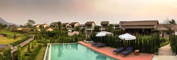 2 outdoor pools, open 8:00 AM to 8:00 PM, pool umbrellas, sun loungers