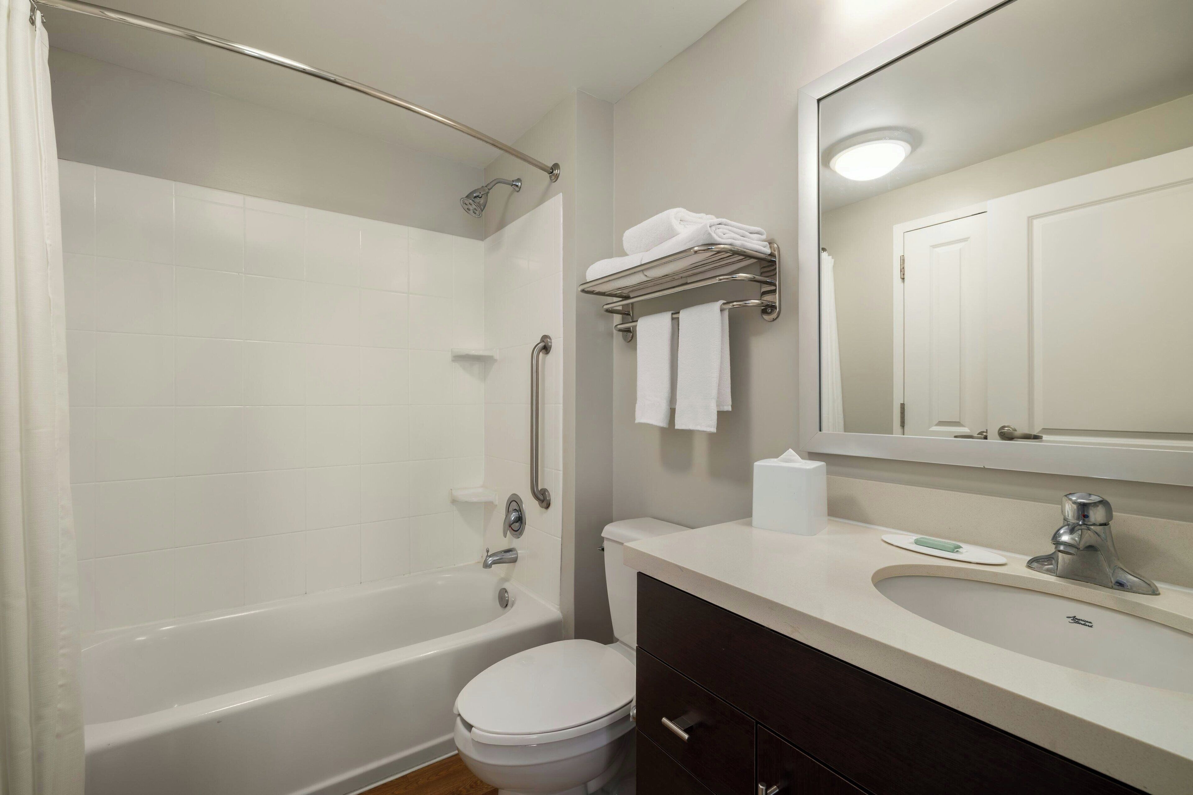 combined shower/bathtub, hair dryer, towels, soap