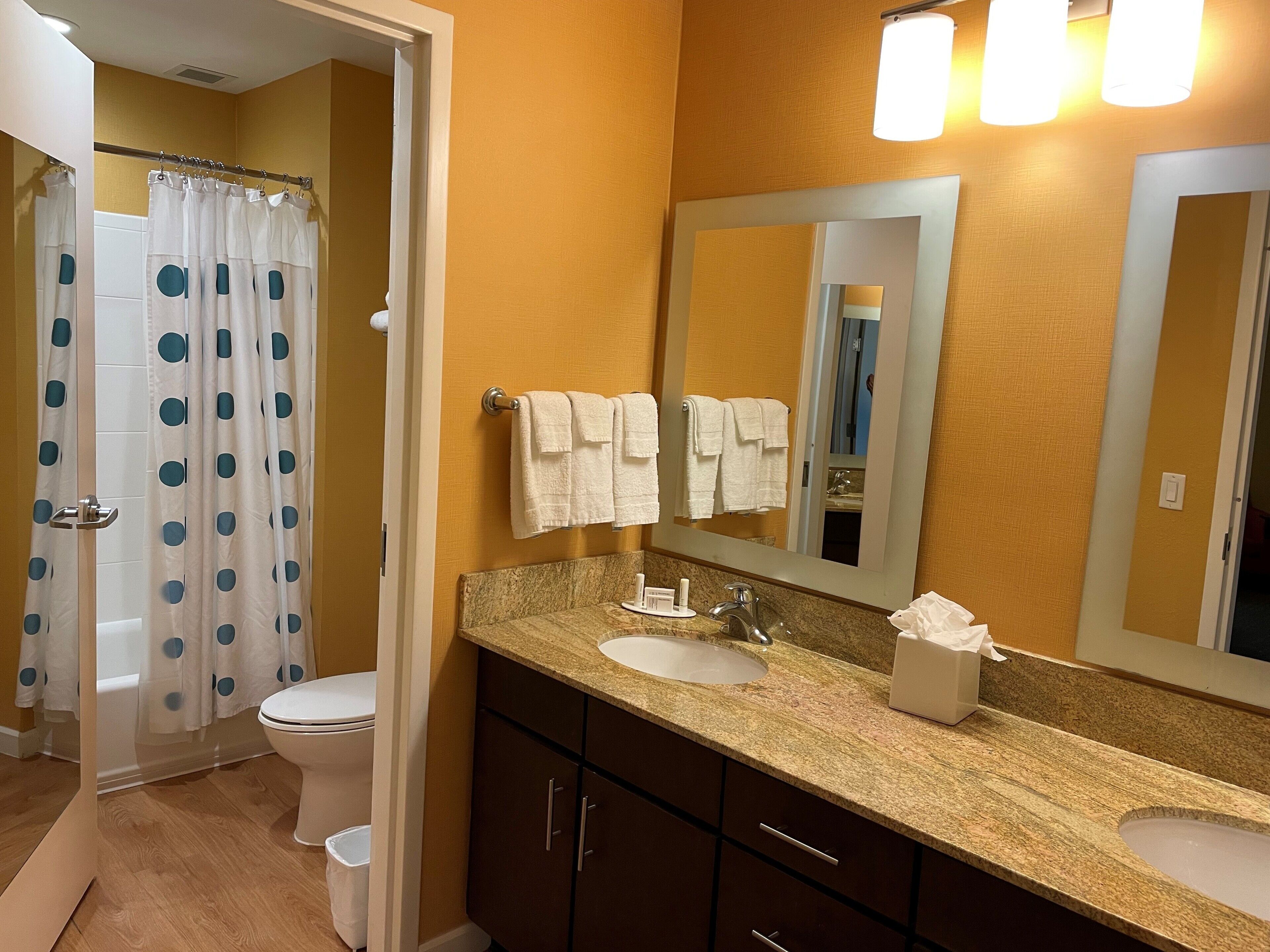 suite, 2 bedrooms | bathroom | combined shower/bathtub, deep-soaking bathtub, free toiletries