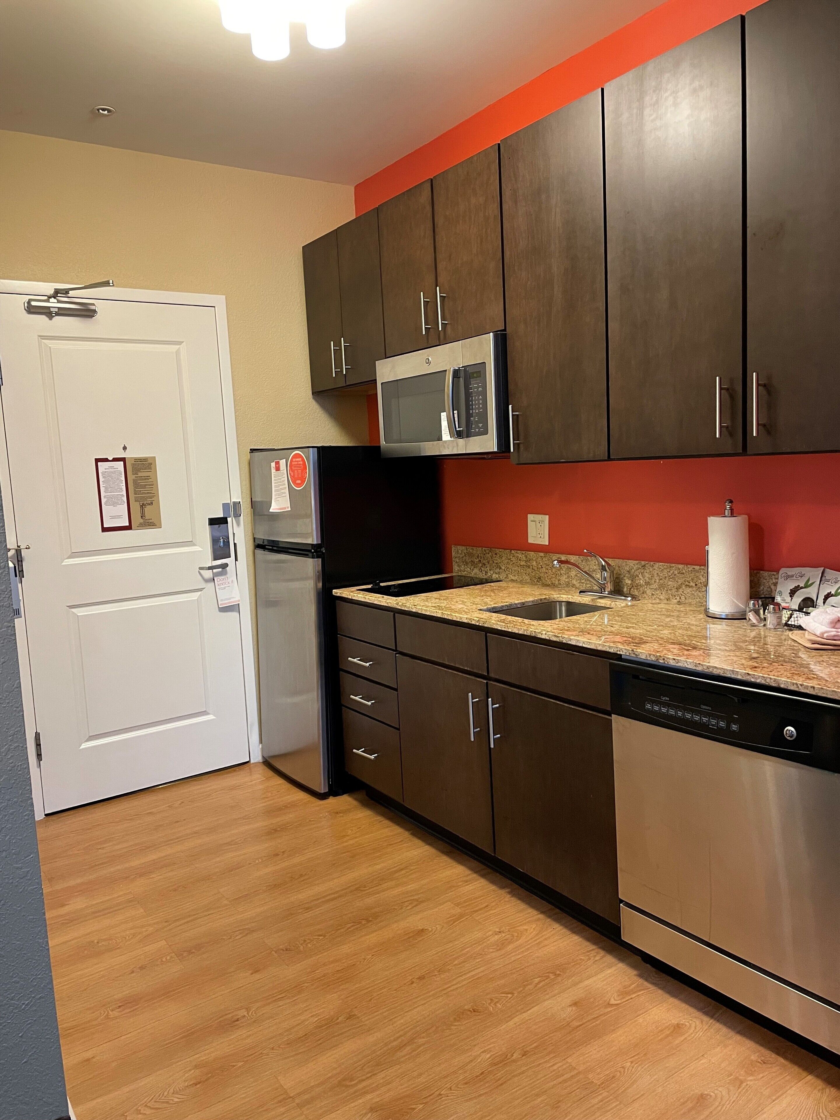 full-sized fridge, microwave, stovetop, dishwasher