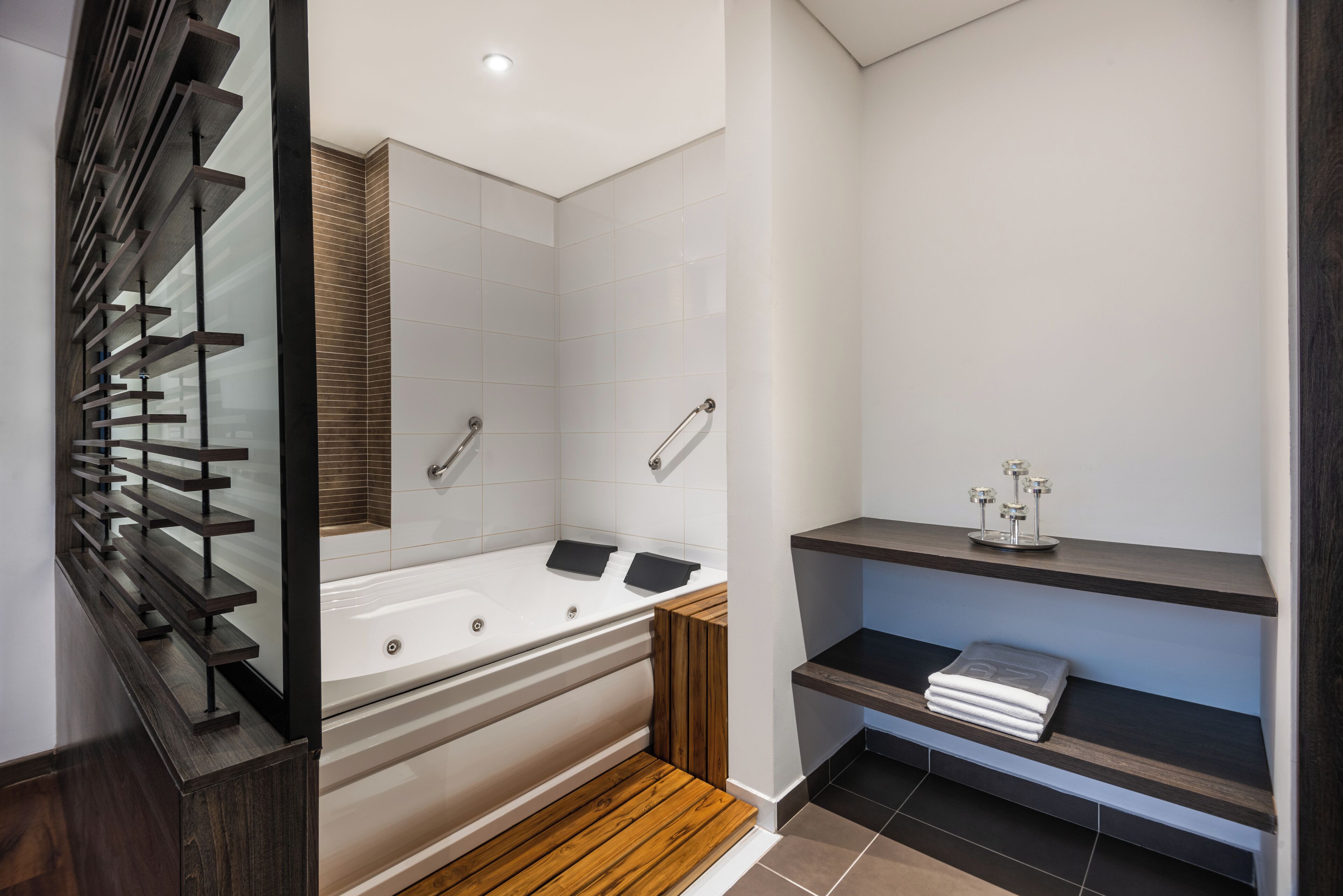 superior studio suite, 1 king bed, hot tub | bathroom | free toiletries, hair dryer, towels, soap