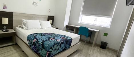 Hypo-allergenic bedding, minibar, in-room safe, desk