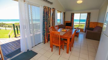 3 Bedroom Deluxe 6 Berth Cabin | Living area | LCD TV, DVD player