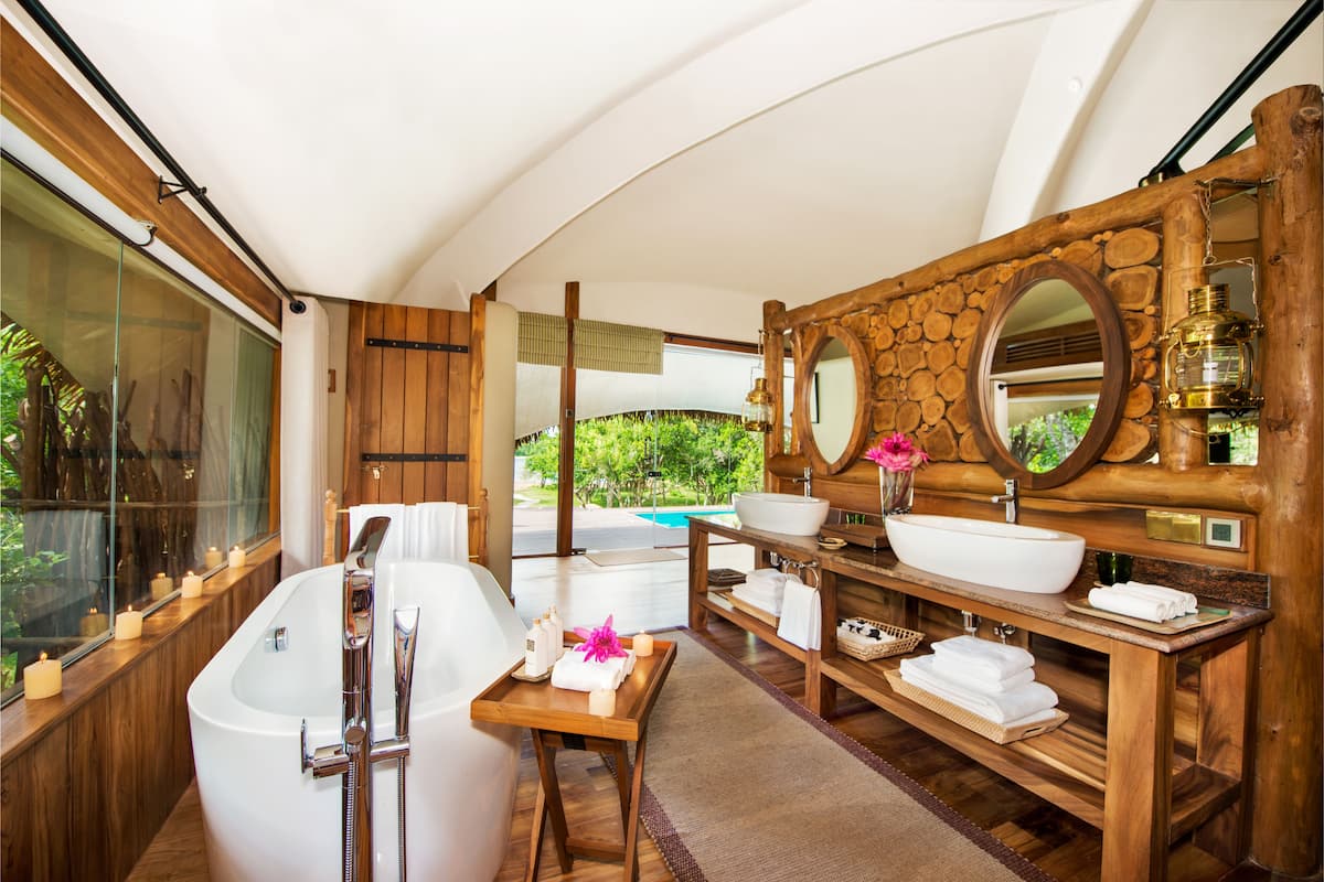all inclusive luxury cabin with safari | bathroom | separate bathtub and shower, hydromassage showerhead, free toiletries